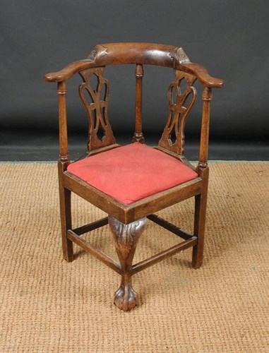 Lot 855 - A George II revival mahogany child's corner chair, 19th century