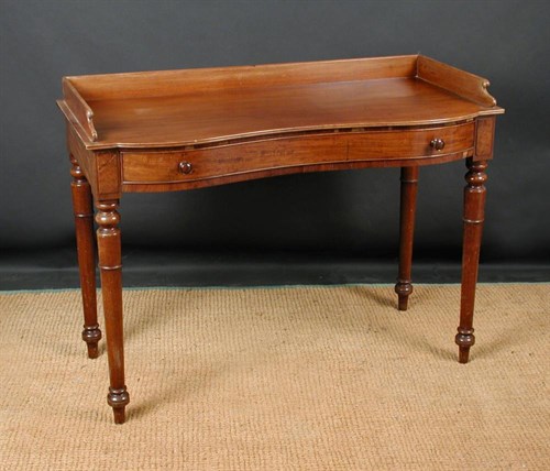 Lot 913 - A Victorian mahogany serpentine front side table
