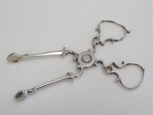 Lot 391 - A pair of 18th century silver sugar nips