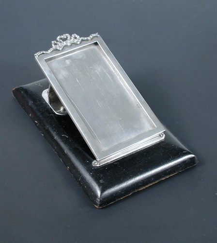 Lot 363 - A silver letter clip with integral photograph frame