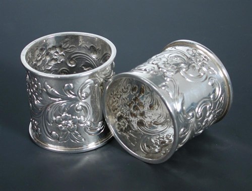 Lot 380 - A large pair of Edwardian silver napkin rings