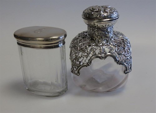 Lot 312 - A Victorian silver mounted dressing table bottle
