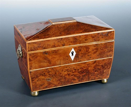 Lot 673 - A Regency burr yew wood tea caddy