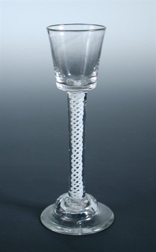 Lot 67 - A mid 18th century opaque twist cordial glass