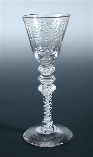 Lot 71 - The engraving attributed to the workshop of Jacob Sang, a mid 18th century English glass marriage goblet