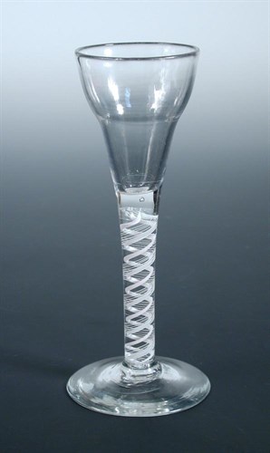 Lot 74 - An 18th century opaque twist wine glass
