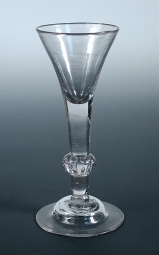 Lot 79 - An early 18th century wine glass
