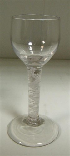 Lot 84 - An 18th century opaque twist wine glass