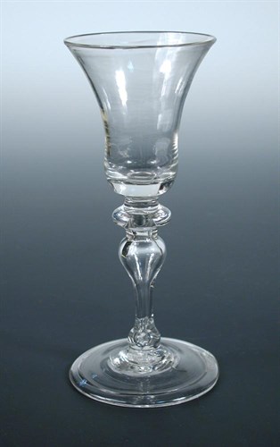 Lot 92 - A mid 18th century baluster wine glass