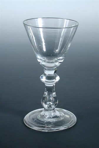 Lot 100 - An early 18th century wine glass