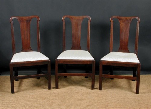 Lot 831 - Three early George II mahogany dining chairs, circa 1740
