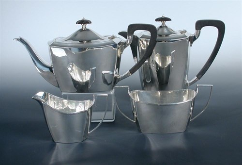 Lot 382 - A silver four piece tea set