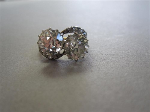 Lot 243 - A large diamond two stone crossover ring