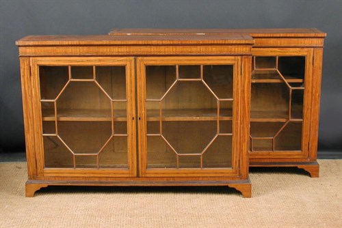 Lot 906 - A pair of late Victorian satinwood bookcases