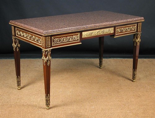 Lot 907 - A French mahogany and ormolu mounted console table in the manner of Francois Linke