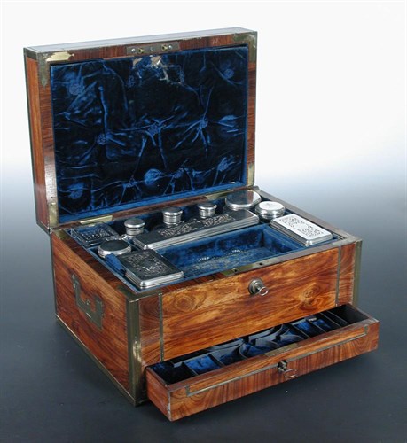 Lot 356 - A Regency Tulip wood and brass bound lady's travelling case
