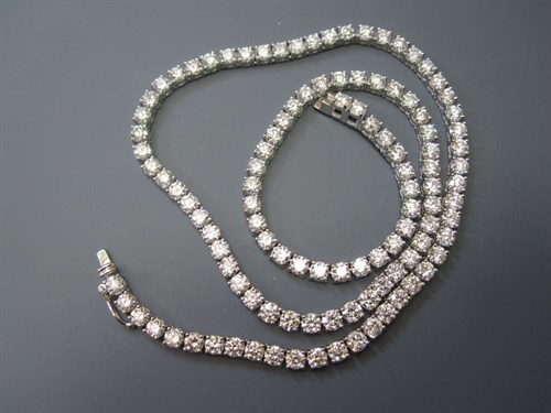 Lot 249 - A diamond line necklace