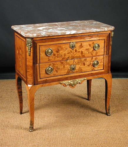 Lot 859 - A French transitional satinwood and floral marquetry commode