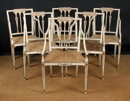 Lot 861 - A set of six George III painted and parcel gilt dining chairs